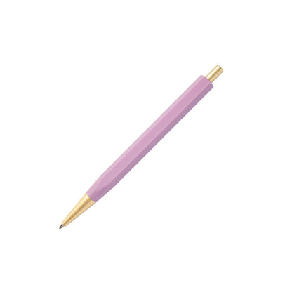 Pink pen with gold accents on a white background