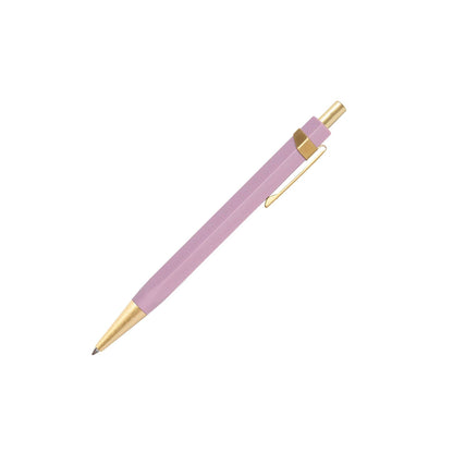Pink pen with gold accents on a white background