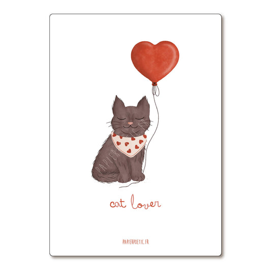 Illustration of a cat holding a heart-shaped balloon with 'cat lover' text on a white background.