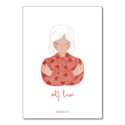 A minimalist art print featuring an illustration of a woman with white hair hugging herself, wearing a red shirt patterned with red hearts. Below the illustration, the words 'self love' are written in a cursive red font, with 'PAPERPOESY.