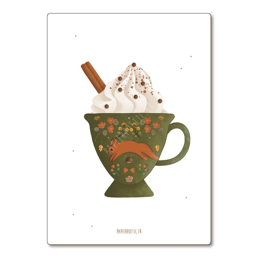 A vertical art print featuring an illustration of a green ceramic mug filled with whipped cream, chocolate chips, and a cinnamon stick, with a small orange fox motif on the mug. The print is displayed on a clean white background with a subtle drop shadow.