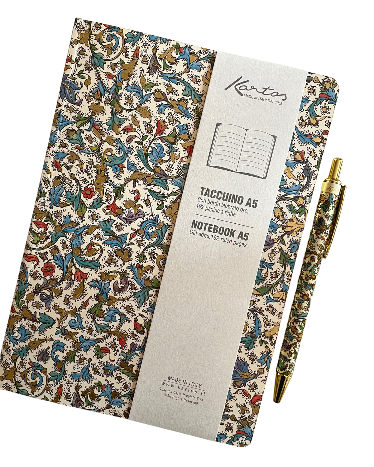 A Kento notebook with an ornate multicolor floral and scroll pattern on a cream background, shown with a white paper sleeve and a matching gold pen on a clean white background.