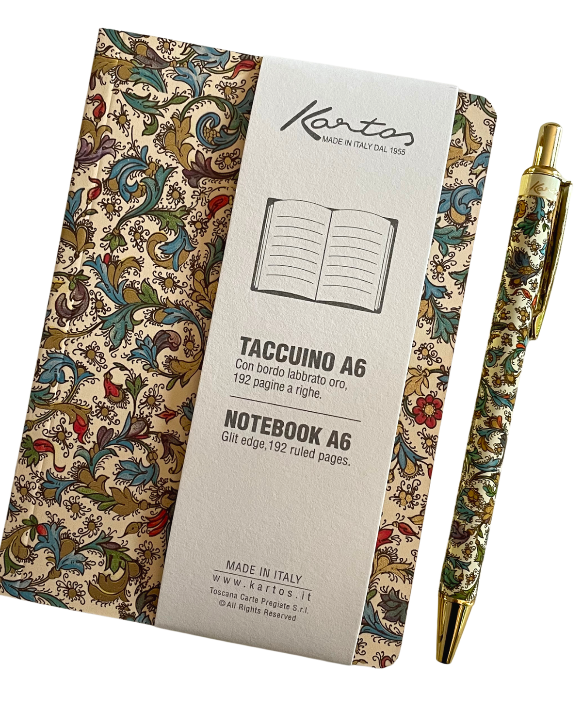 Taccuino Kartos formato A6 con copertina a motivi floreali vintage, mostrato accanto a una penna con lo stesso motivo su uno sfondo bianco pulito.