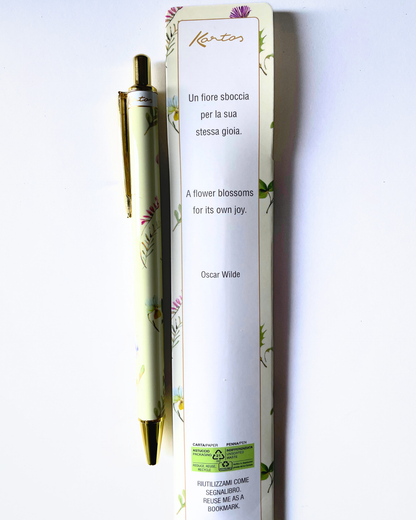 A Kencos brand ballpoint pen with a pale green floral pattern and gold accents, shown next to its white packaging box on a plain white background.