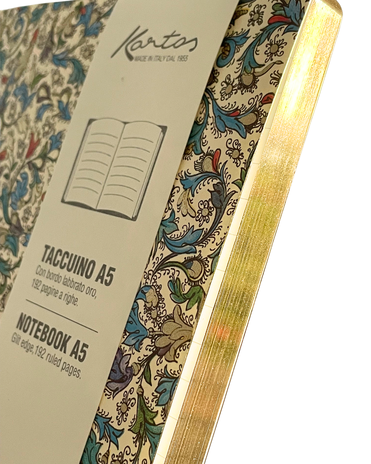 A close-up of a Kanto's A5 notebook showing its cream-colored cover with a classic blue and green floral pattern, a gold metallic edge, and the product's paper count printed on the side.