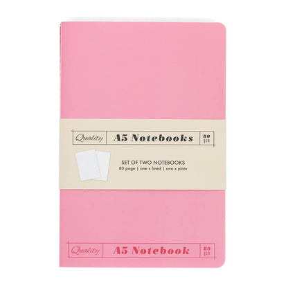 Set of two A5 notebooks with pink cover and beige label on a white background