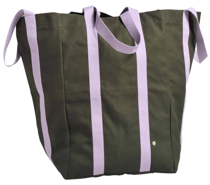 Green tote bag with purple straps on a white background