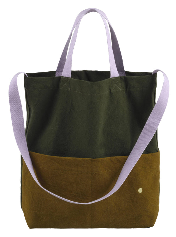 Two-toned green and brown tote bag with white straps on a white background