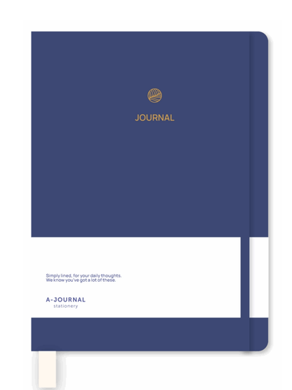 A navy blue hardcover journal with a white lower band, gold foil logo and the word 'JOURNAL' on the cover, shown standing upright against a white background.