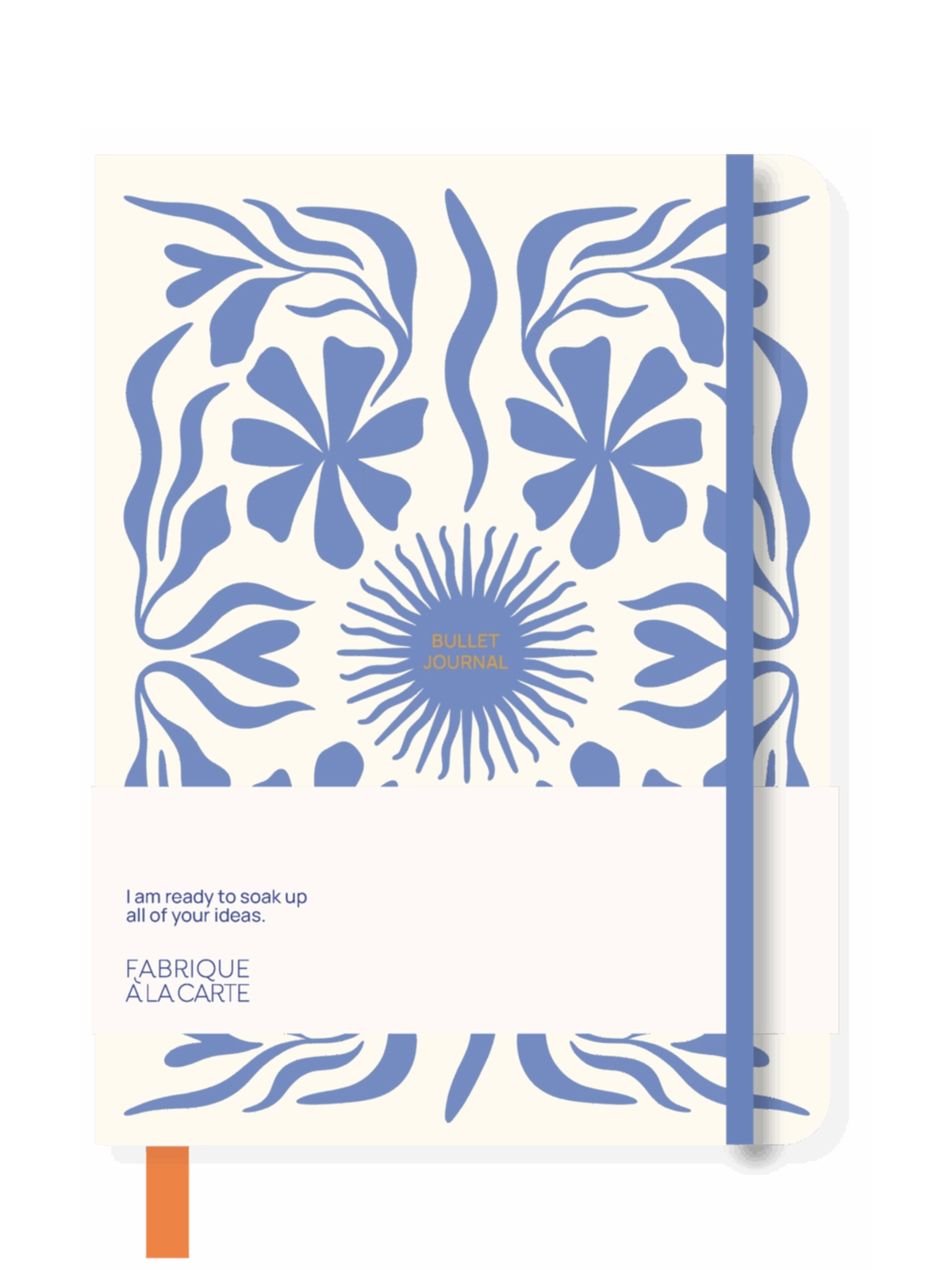 A notebook with a cream-colored cover featuring a blue floral and leaf pattern, a blue elastic closure band, and a small orange bookmark tab at the bottom left. The cover includes the text 'I am ready to soak up all of your ideas.