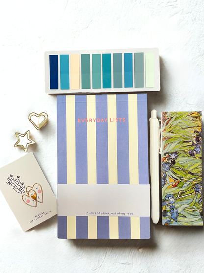 Striped notebook with 'Everyday Life' branding on a white background