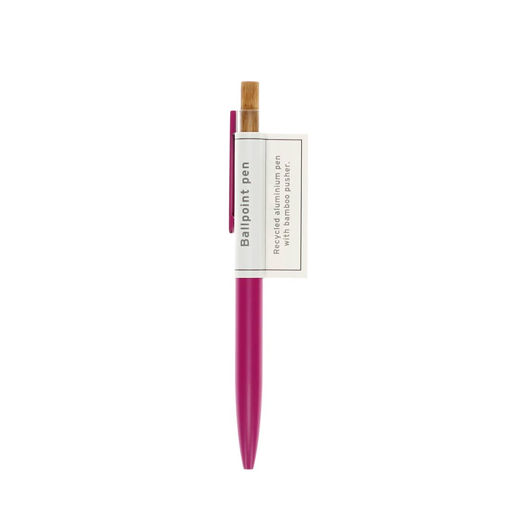 Pink ballpoint pen with a white label on a white background