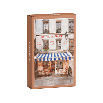 Product packaging with a scenic image of a French bistro on a clear background