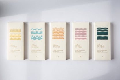 Five books with colorful watercolor covers on a white background
