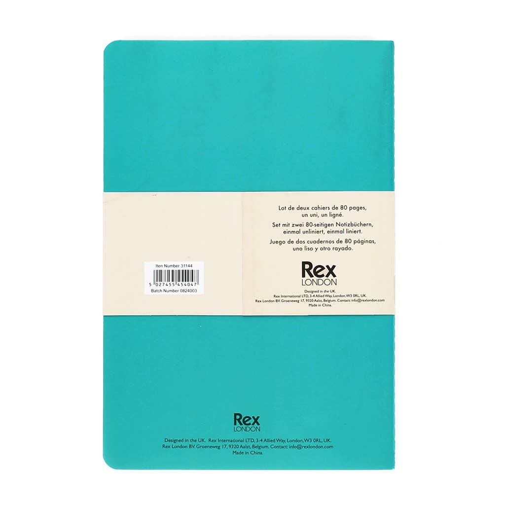 Teal notebook with beige label on a white background
