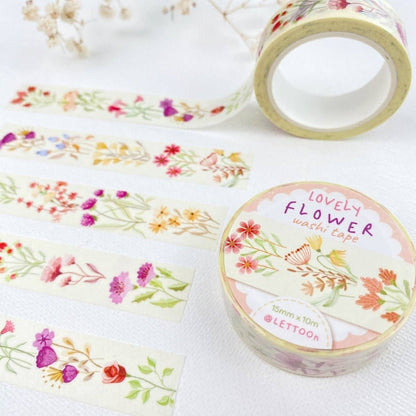 Floral washi tape with a visible brand label on a white background