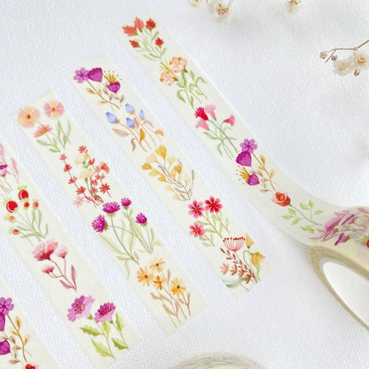 Floral washi tape with a pair of scissors on a white background