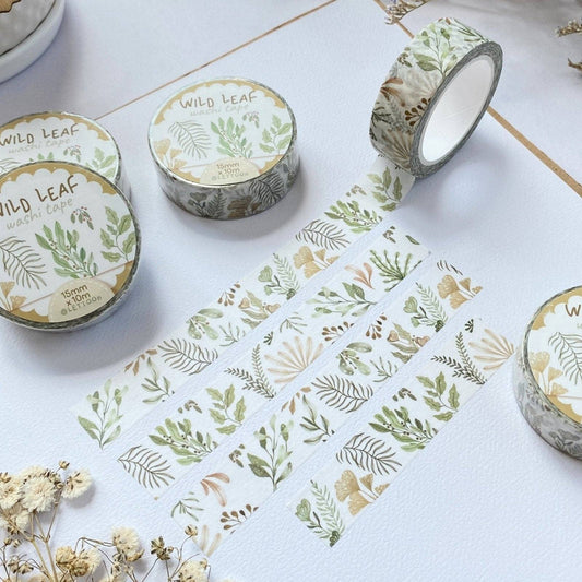 Washi tape with leaf design on a white surface