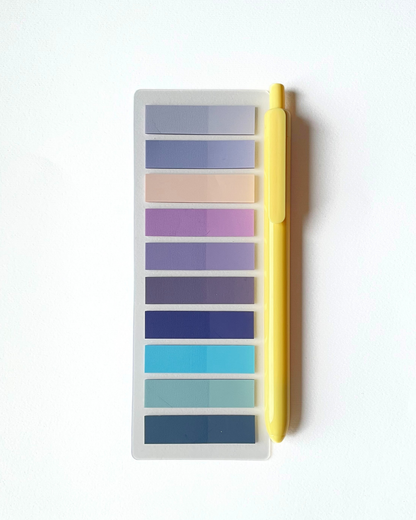 Color swatch with a yellow pen on a white background