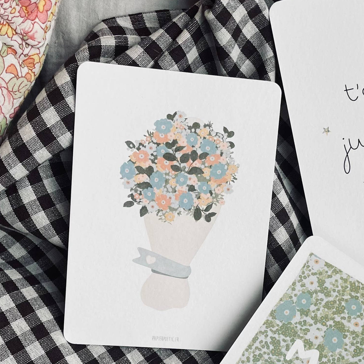 Card shows a bouquet illustration