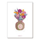 Colorful bouquet of flowers in a striped vase on a white background