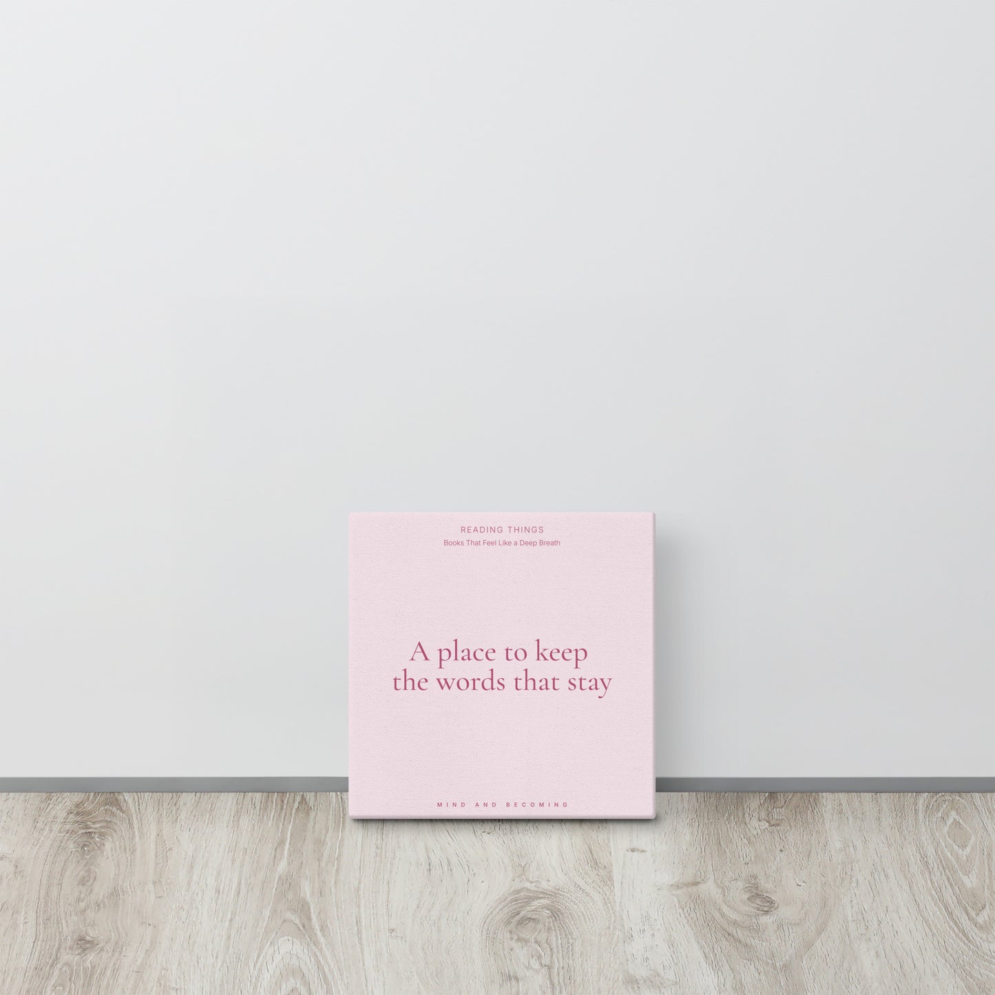 Book with pink cover and text on a light gray background