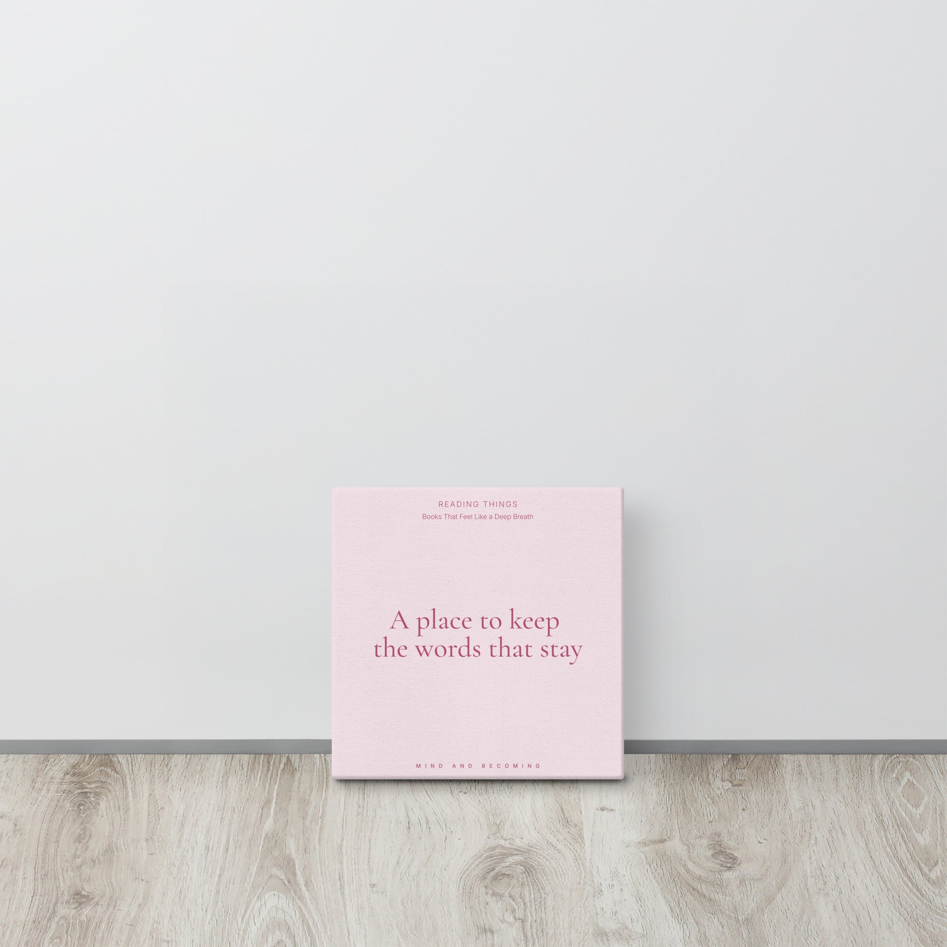 Book with pink cover and text on a light gray background