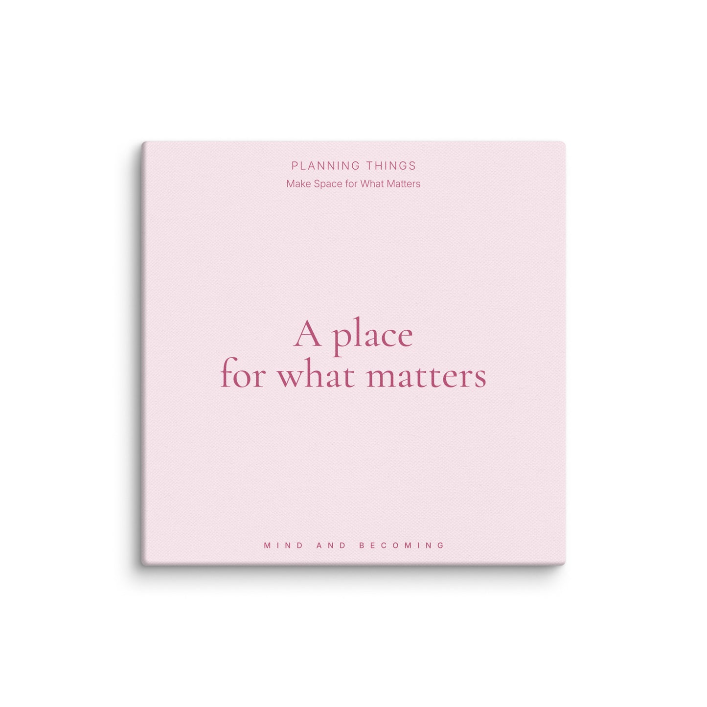 Pink planner with text on a white background
