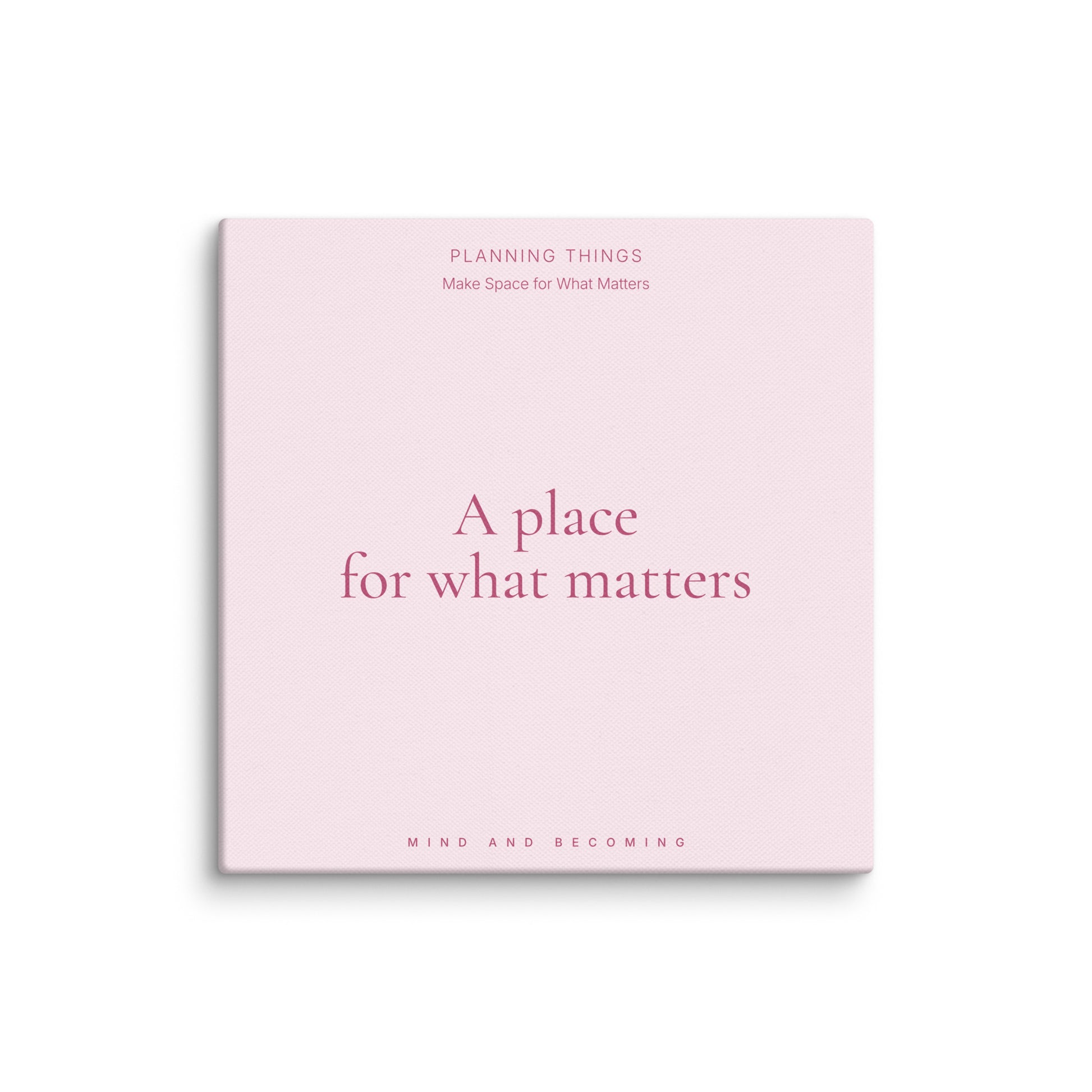 Pink planner with text on a white background