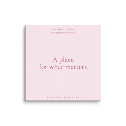 Pink planner with text on a white background