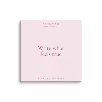 Pink book titled 'Write what feels true' on a white background