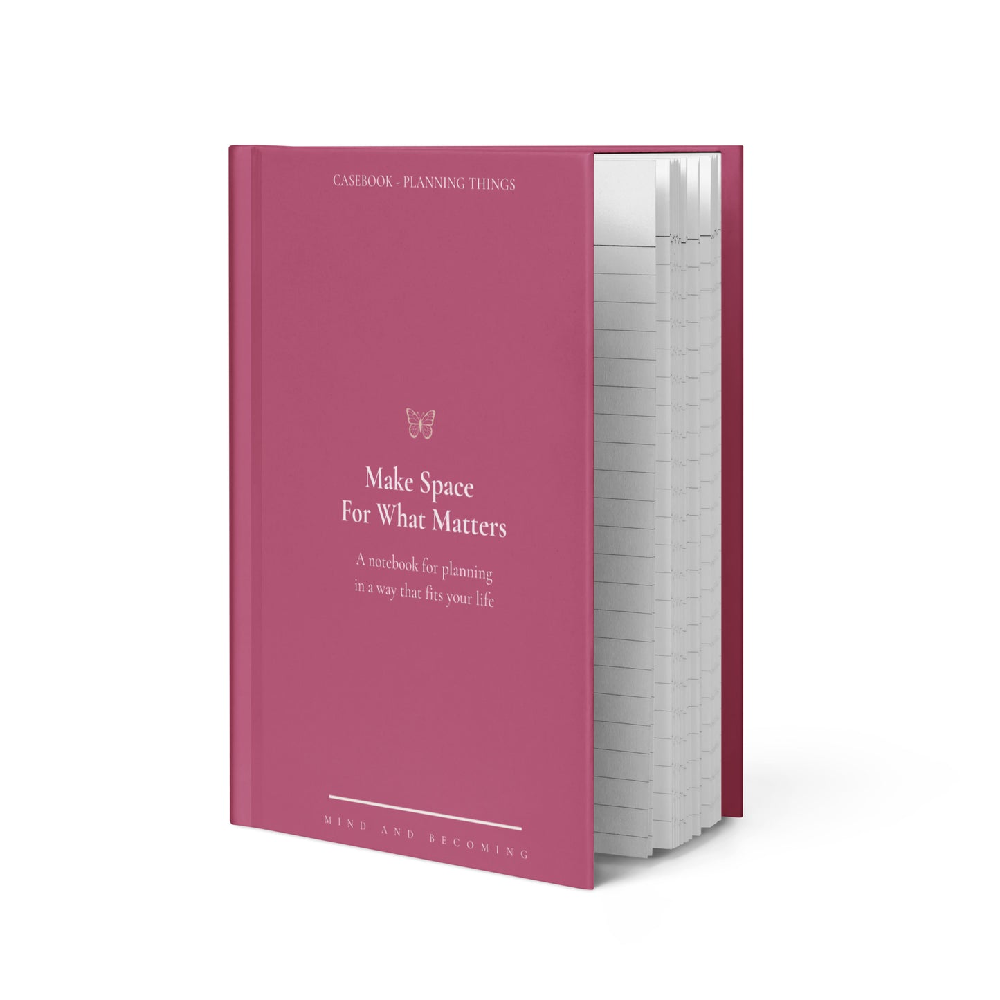 Pink notebook with text on a white background