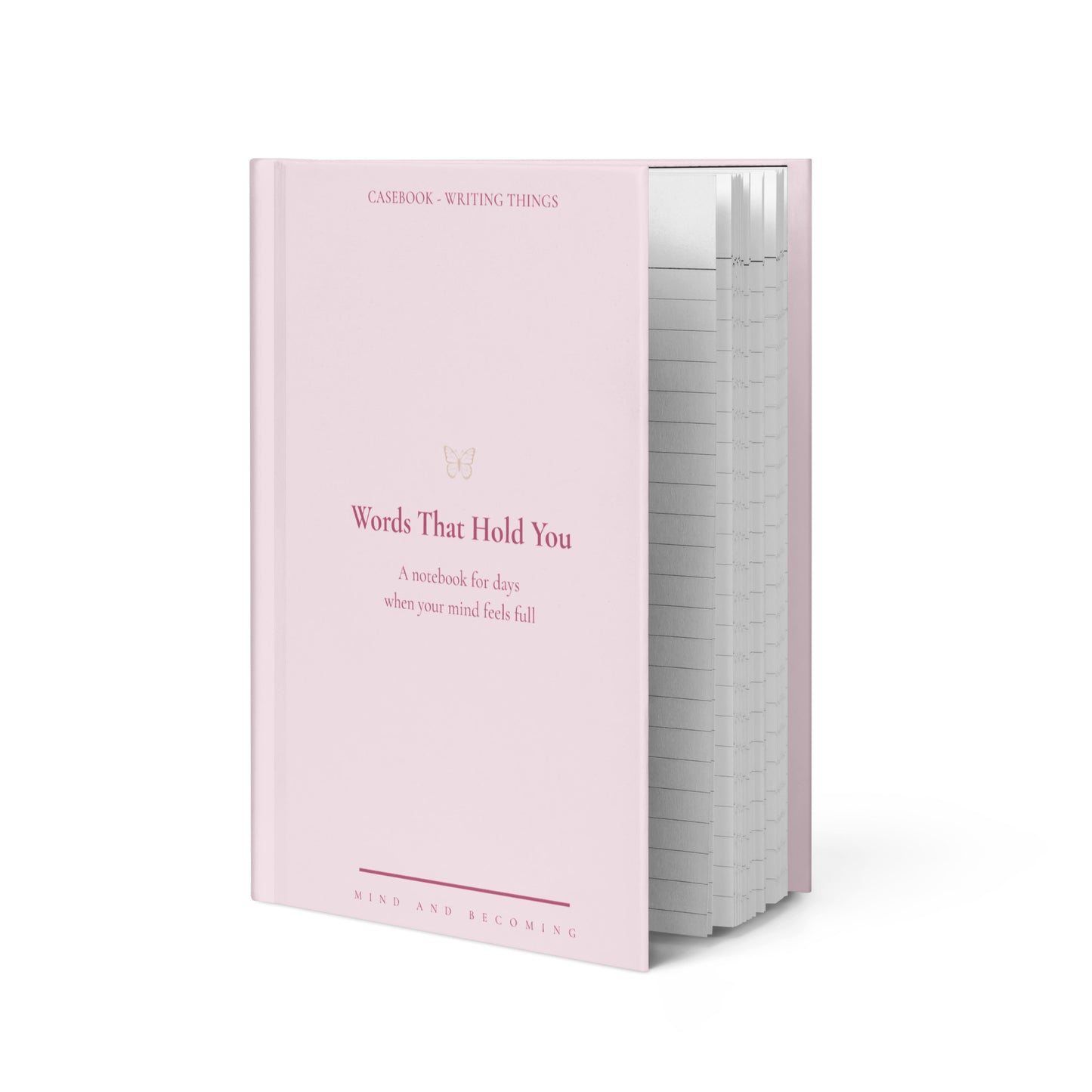 Pink notebook titled 'Words That Hold You' on a white background