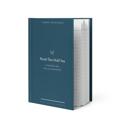 Blue notebook titled 'Words That Hold You' on a white background