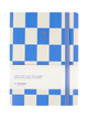 white and blue notebook